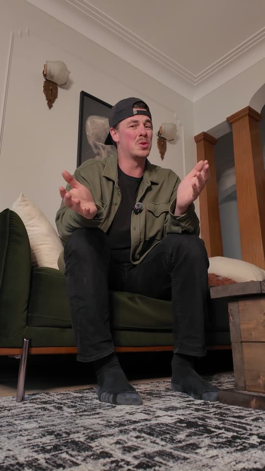 A raw phone clip: Marc sitting on his sofa, talking to the camera. No captions, no effects.